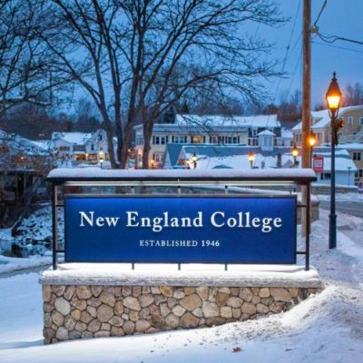 Campus sign on NEC's Henniker campus is winter